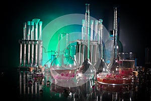 Pharmacy and chemistry theme. Test glass flask with solution in research laboratory. Science and medical background. Laboratory