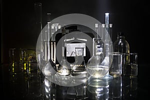 Pharmacy and chemistry theme. Test glass flask with solution in research laboratory. Science and medical background. Laboratory