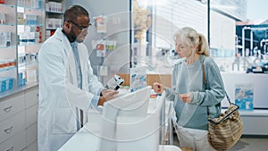 Pharmacy Drugstore Checkout Cashier Counter: Black Male Pharmacist Service Senior Female Customer