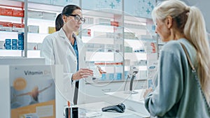 Pharmacy Drugstore Checkout Cashier Counter: Female Pharmacist Explains Use and Manual for