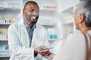 Pharmacy, medicine and pharmacist in discussion with a patient explaining her prescription. Healthcare, medical and