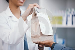 Pharmacy, product and pharmacist giving customer bag for pills prescription, medical supplements and medicine