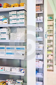 Pharmacy, shelf and boxes for healthcare, empty or pharmaceutical stock for wellness, health and interior. Shop, store