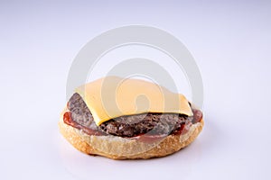 Phased assembly of a hamburger on a light background30
