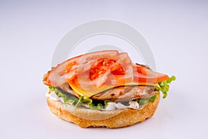 Phased assembly of a hamburger on a light background37