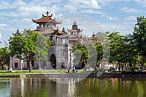 Phat Diem cathedral under blue sky in Ninh Binh, Vietnam