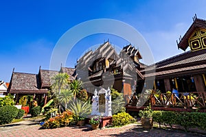 Phayao, Thailand - January, 09, 2022 : Wooden temple Burmese style architecture. The gable roof is raised into a bouquet of