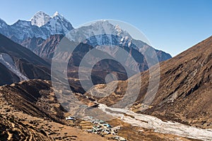 Pheriche village with Kangtega and Thamserku mountain peak behind. A village in Everest base camp trekking route. Himalaya