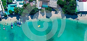 Phi Phi Don, Thailand. Overhead panoramic aerial view of Phi Phi Island coastline and beach from drone on a hot sunny day