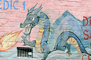 PHILADELPHIA, PA - MAY 14: Fire breathing dragon graffti artwork mural in the Chinatown section of downtown Philadelphia