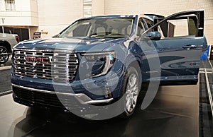 Philadelphia, Pennsylvania, U.S.A - January 14, 2024 - A light blue color of 2024 GMC Arcadia SUV