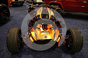 Philadelphia, Pennsylvania, U.S - January 14, 2024 - The metallic orange color of Can-Am Ryker bike