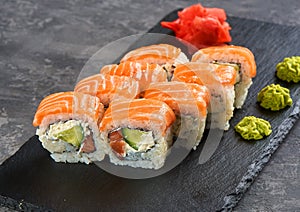 Philadelphia roll sushi with salmon, prawn, avocado, cream cheese. Sushi menu. Japanese food.
