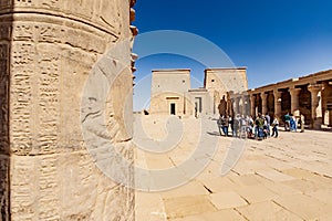 Philae Egyptian temple of Isis god in Aswan. Focus on the temple in the background