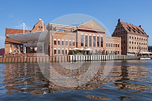 Philharmonic Hall on the Olowianka Island in Gdansk and Motlawa River, Poland.