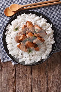 Philippine Adobo chicken with rice vertical view from above