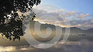 Philippines. Fishing boat at sunrise.