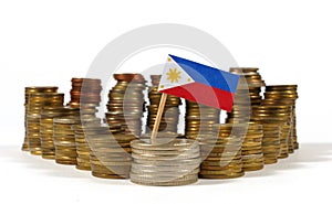 Philippines flag with stack of money coins