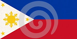 Philippines national fabric flag textile background. Symbol of Asian country