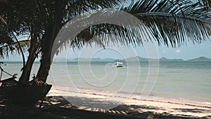 Philippines scape, Sibaltan Tropical Beach on El Nido island, Asia. Traditional boat on ocean bay