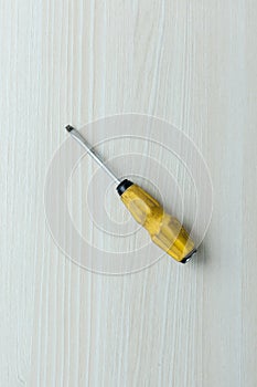 Philips screwdriver with yellow and black handle photo