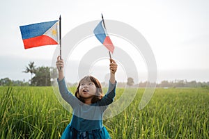 Phillipine kid with national flag