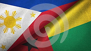 Phillippines and Guinea-Bissau two flags textile cloth, fabric texture