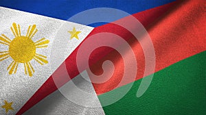 Phillippines and Madagascar two flags textile cloth, fabric texture