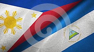 Phillippines and Nicaragua two flags textile cloth, fabric texture