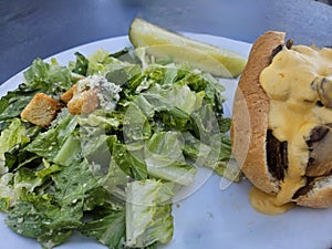 Philly cheese steak and Ceasar salad