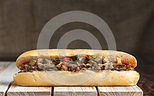 Philly cheese steak on wooden surface