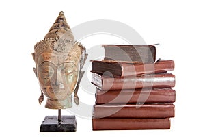 Philosophy and wisdom. The philosopher Buddha with ancient theology text books.