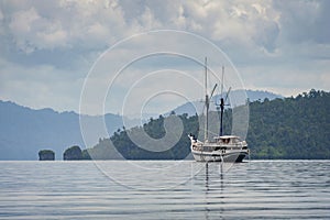 Phinisi Schooner Anchored in Raja Ampat, Indonesia