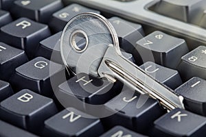 phishing, hacking personal data and money , key and hook on computer keyboard