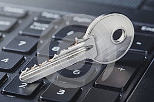 phishing, hacking personal data and money , key and hook on computer keyboard