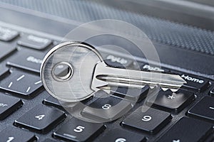 phishing, hacking personal data and money , key and hook on computer keyboard