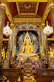 Phitsanulok, Thailand - December 30, 2018: Phra Buddha Chinnarat statue in chapel at Wat Phra Sri Rattana Mahathat (Wat Yai)