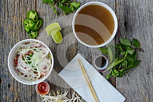 Pho Fast Food To Go on Wood Background