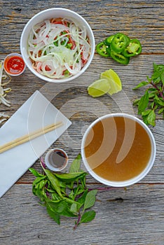 Pho Fast Food To Go on Wood Background