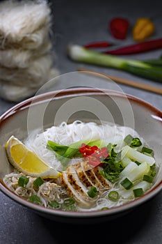 pho soup with chicken meat and vegetables