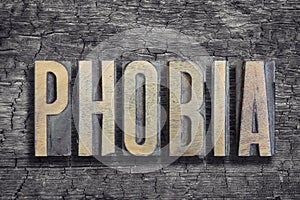 Phobia word burned wood photo