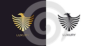 Phoenix Gold shield logo stylized golden flying bird