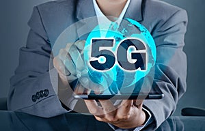 Phone 5g Earth businessman connect worldwide waiter hand holding an empty digital tablet with smart and 5G network connection