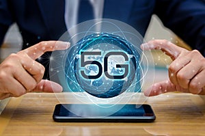 Phone 5g Earth businessman connect worldwide waiter hand holding an empty digital tablet with smart and 5G network connection conc