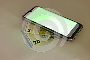 Phone on banknotes