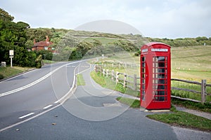 Phone booth and road on hills