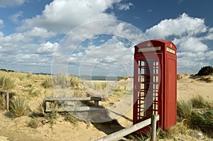 Phone box on beach at Studland Bay near Swanage in Dorset