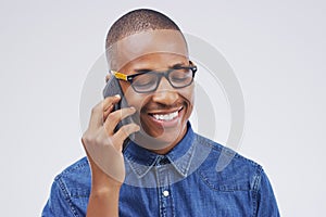 Phone call, happy and black man in studio with smile for conversation, talking and chatting. Communication mockup, white