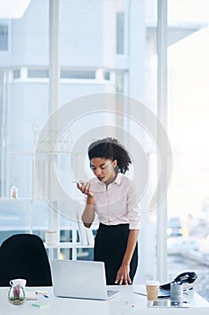 Phone call, laptop and business with woman, loudspeaker and connection with conversation, planning and network. Employee