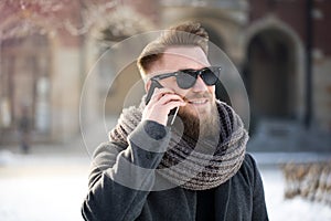 Phone call in winter scenery